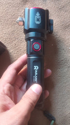 Ruilang RL-2210 tactical flashlight side view showing power button and body